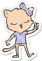 distressed sticker of a cartoon cat with bow on head giving peace sign vector