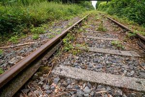 railway tracks in the countryside photo