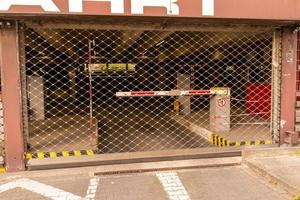 Barred entrance to the underground garage photo