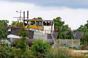 boat on the shore photo