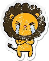 distressed sticker of a cartoon crying lion with crossed arms vector