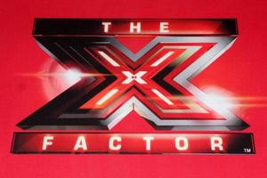 LOS ANGELES, DEC 19 - X Factor Logo at the FOX s The X Factor Press Conference at CBS Studios on December 19, 2011 in Los Angeles, CA photo