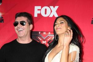 LOS ANGELES, DEC 19 - Simon Cowell, Nicole Scherzinger at the FOX s The X Factor Press Conference at CBS Studios on December 19, 2011 in Los Angeles, CA photo