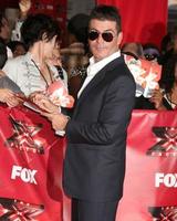 LOS ANGELES, SEP 14 - Simon Cowell arriving at the X-Factor Premiere Screening at ArcLight Theater on September 14, 2011 in Los Angeles, CA photo