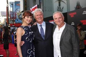 LOS ANGELES, AUG 13 - Olga Kurylenko, Roger Donaldson, Bill Smitrovich at The November Man Premiere at TCL Chinese Theater on August 13, 2014 in Los Angeles, CA photo