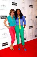 LOS ANGELES, JUN 9 -  Lisa Rinna, Garcelle Beauvais arrives at the 2013 Plush Show at the Hyatt Regency Century Plaza Hotel on June 9, 2013 in Century City, CA photo