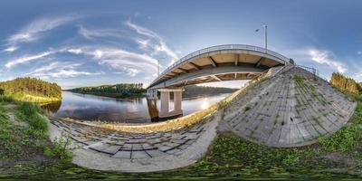 full seamless spherical hdri panorama 360 degrees angle view near steel frame construction of huge car bridge across river  in equirectangular projection. VR  AR content photo