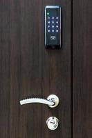 wooden door with electronic combination lock photo