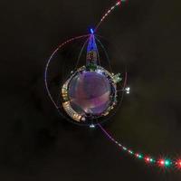 New year little planet.  Spherical aerial 360 degree panorama night view on a festive square with a Christmas tree photo