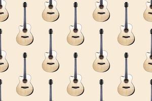 Seamless pattern of wood texture of lower deck of six strings acoustic guitar on light background photo