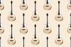 Seamless pattern of wood texture of lower deck of six strings acoustic guitar on light background photo