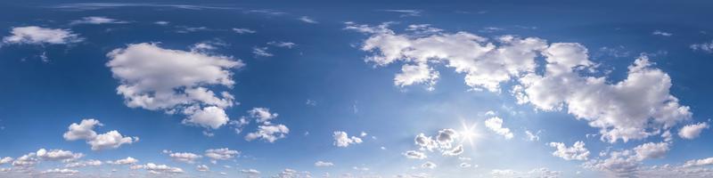 blue sky with beautiful fluffy clouds without ground. Seamless hdri panorama 360 degrees angle view for use in 3d graphics or game development as sky dome or edit drone shot photo