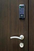 wooden door with electronic combination lock photo