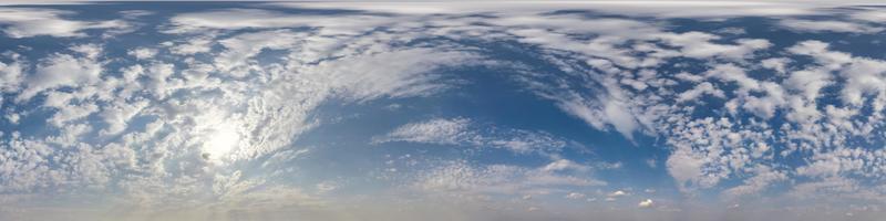 Seamless cloudy blue sky hdri panorama 360 degrees angle view with zenith and beautiful clouds for use in 3d graphics as sky dome or edit drone shot photo