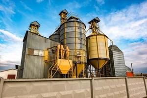 agro-processing and manufacturing plant for processing and silver silos for drying cleaning and storage of agricultural products, flour, cereals and grain. Granary elevator photo