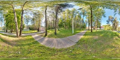 Panorama in park forest road.  Full 360 by 180 degree seamless spherical panorama in equirectangular equidistant projection. VR AR content photo