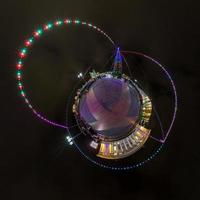 New year little planet.  Spherical aerial 360 degree panorama night view on a festive square with a Christmas tree photo