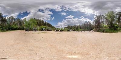 Panorama in open air museum of armored vehicles partisan camp.  Full 360 by 180 degree seamless spherical panorama in equirectangular equidistant projection. VR AR content photo