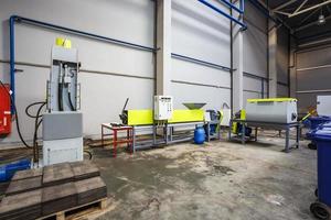 Separate garbage collection. Equipment for pressing debris sorting material to be processed in a modern waste recycling plant. photo