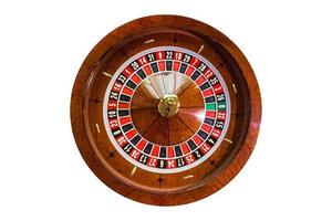 fichas de juego en una ruleta de mesa de juego foto