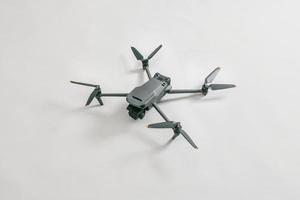 explore consumer drone with unique tele camera scout and plan your shots on gray background photo