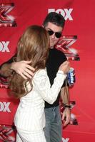 LOS ANGELES, DEC 19 - Paula Abdul, Simon Cowell at the FOX s The X Factor Press Conference at CBS Studios on December 19, 2011 in Los Angeles, CA photo