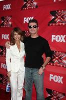 los angeles, 19 de diciembre - paula abdul, simon cowell en la conferencia de prensa fox s the x factor en cbs studios el 19 de diciembre de 2011 en los angeles, ca foto