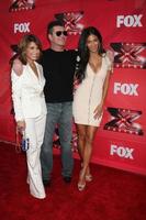 LOS ANGELES, DEC 19 - Paula Abdul, Simon Cowell, Nicole Scherzinger at the FOX s The X Factor Press Conference at CBS Studios on December 19, 2011 in Los Angeles, CA photo