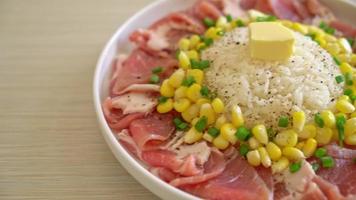 fresh pork raw sliced with rice and corn on white plate and ready to cook video