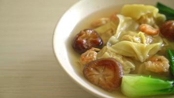 pork dumpling soup with shrimps and vegetable - Asian food style