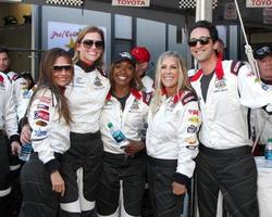 LOS ANGELES, APR 11 - Vanessa Marcil, Tricia Helfer, Carmelita Jeter, Lisa Stanley, Adrien Brody at the 2014 Pro Celeb Race Qualifying Day at Long Beach Grand Prix on April 11, 2014 in Long Beach, CA photo