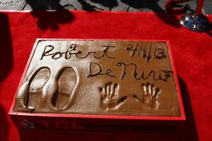 LOS ANGELES, FEB 4 - Robert DeNiro hand and foot prints in cement at the Robert DeNiro Handprint and Footprint Ceremony at the TCL Chinese Theater forcourt on February 4, 2013 in Los Angeles, CA photo