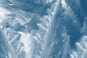 Abstract ice frost natural background with hoarfrost crystals. photo