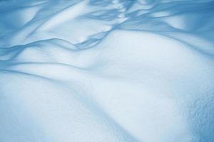 antecedentes. paisaje de invierno la textura de la nieve foto