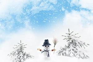 happy snowman. Winter landscape. Merry christmas and happy new year greeting card photo