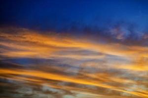 Blurred background. Bright sky with fluffy clouds. photo