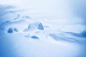 antecedentes. paisaje de invierno la textura de la nieve foto