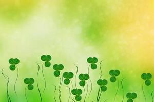 Green clover leaves on a background summer landscape photo