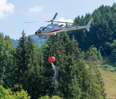 Bergamo Italy July 2022 Helicopter used to transport water to put out fires photo