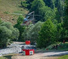Bergamo Italy July 2022 Helicopter used to transport water to put out fires photo