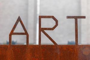 Rusty metal sign. letters ART photo