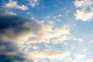 dark blue sunset sky with rain clouds photo