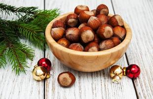 Bowl with hazelnuts photo