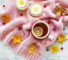 autumn flat lay with cup of tea and leaves