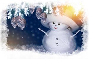 happy snowman. Winter landscape. Merry christmas and happy new year greeting card photo