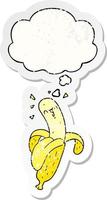 cartoon banana and thought bubble as a distressed worn sticker vector
