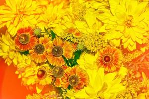 Bouquet of autumn flowers dahlias and marigolds. photo