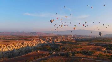 Hot Air Baloons Aerial Drone Flight Over Beautiful Autumn Forrest at Sunrise Mountains Beautiful Landscape Background Sunny Vacation Travel Destination Concept video