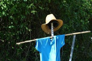 A hat is a headdress that protects from the hot sun. photo