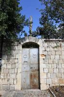 A door is an opening in a wall to enter and exit a building. photo
